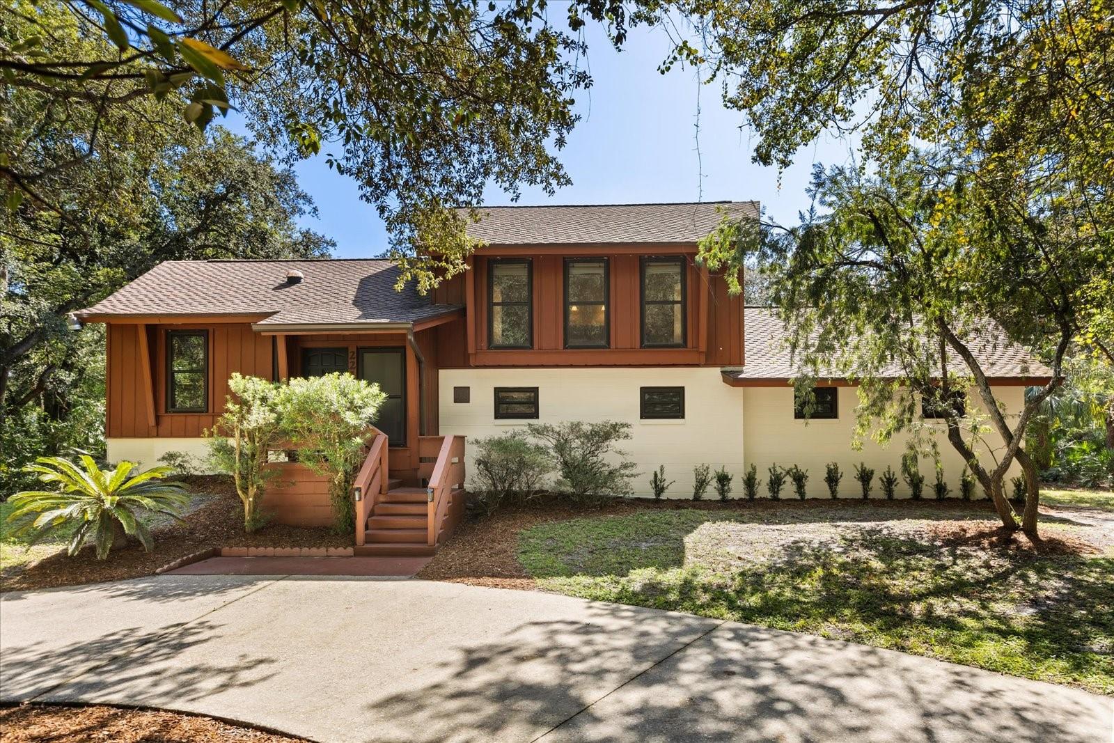 Set among beautiful tree-lined streets, this 3 bedroom, 2.5 bath pool home in Winter Springs blends comfort, charm, and thoughtful updates to create an inviting retreat—offering a sense of escape while still being just a short drive from everything!
The home welcomes you inside with freshly painted walls, and beautiful wood flooring at the entry that continues into the living room, where soaring ceilings, abundant windows, and natural light highlight the open floor plan.
The kitchen features tall, freshly painted solid wood cabinetry, stainless steel appliances, an island with breakfast bar, and a custom backsplash that extends all the way to the ceiling. Perfect for entertaining, the kitchen flows seamlessly to the dining and living areas, with direct access to the screened-in porch overlooking the backyard oasis.
Upstairs, you’ll find the primary bedroom with an updated ensuite bath, walk-in closet, and attic access, along with a guest bedroom with its own walk-in closet and a gorgeous upgraded full bathroom. Both bedrooms and baths showcase brand-new luxury vinyl plank flooring, tall ceilings, and wooded views.
On the lower level, just off the kitchen and dining room, you’ll find a third bedroom, a half bath, the spacious laundry room, and access to the oversized two-car garage with additional storage. And if that isn’t enough, the separate entrance on the side of the home leads to the basement, offering even more storage space!
Step outside to your private, newly fenced backyard oasis with a sparkling pool, lush landscaping, open deck and a spacious screened-in porch—perfect for morning coffee or evening gatherings. A roof replacement in 2020 brings peace of mind, while mini split units (recently deep cleaned) keep your home cool, and can be controlled independently. A circular driveway to the front of the home, along with a separate driveway to the side of the home, add convenience and curb appeal.
Lovingly maintained, this home offers modern upgrades while still leaving room for your personal touches. With its versatile multi-level layout, inviting indoor spaces, and resort-style outdoor retreat, this Winter Springs home is ready for its next chapter! Make your appointment for a private tour today!