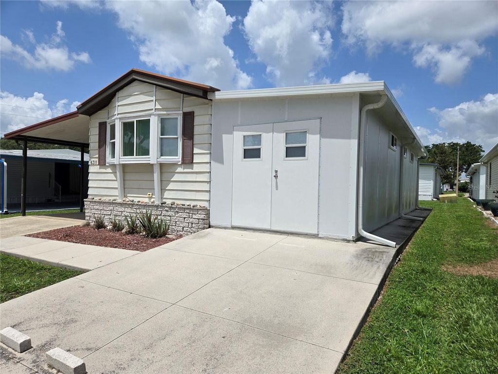 Photo of 6311 Balmy Lane, Zephyrhills, FL 33542 (MLS # TB8411579)