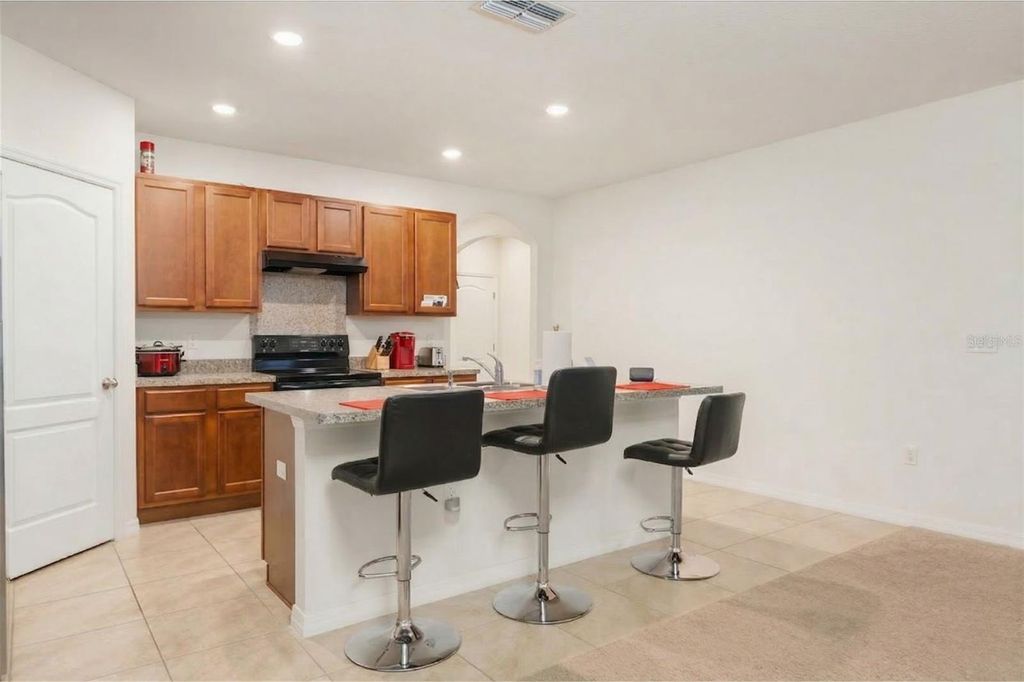 Photo of 943 Summer Glen Drive, Winter Haven, FL 33880 (MLS # O6386883)