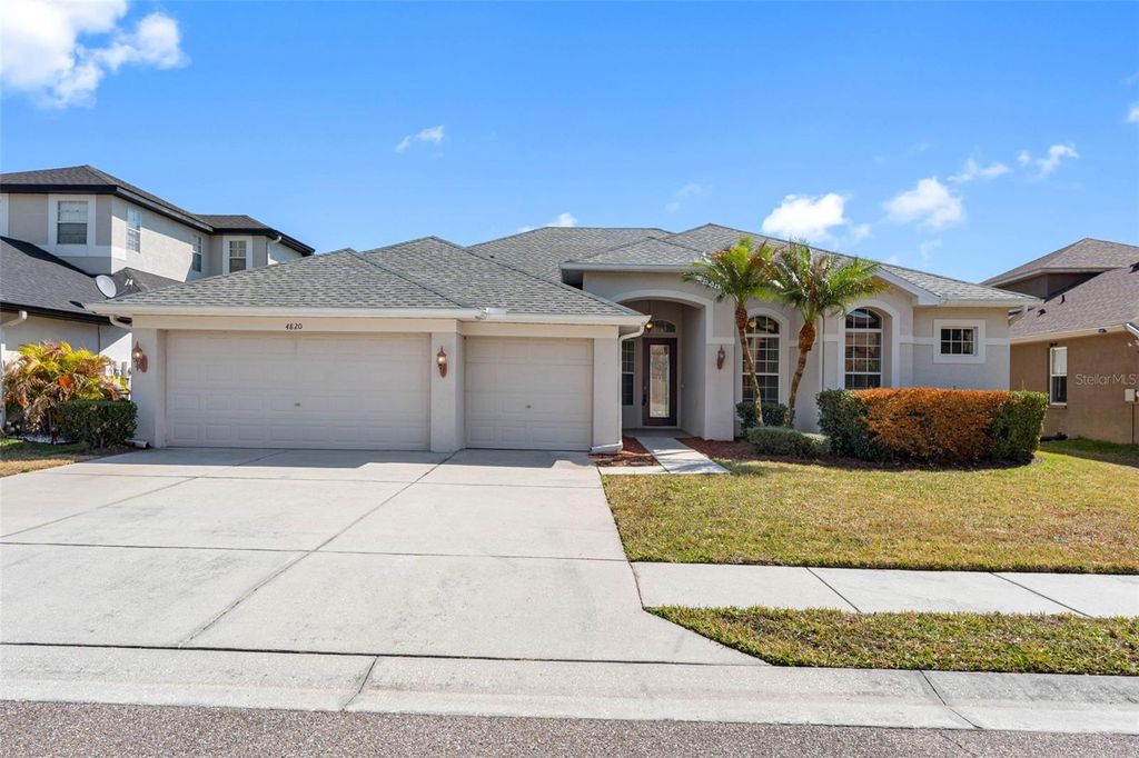 Photo of 4820 Portmarnock Way, Wesley Chapel, FL 33543 (MLS # TB8478421)