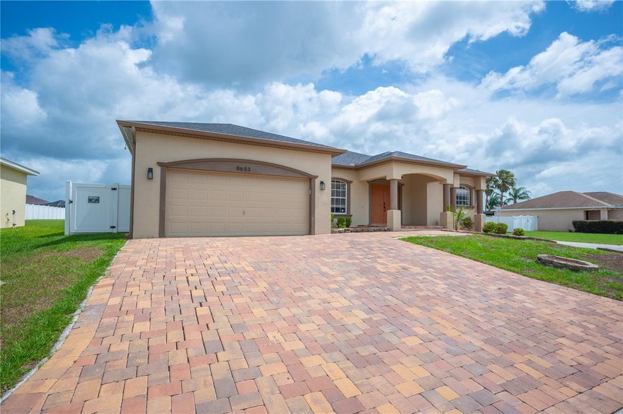 Discover the perfect blend of space, comfort, and convenience in this beautifully maintained 4-bedroom, 2-bath home nestled on a desirable corner lot in the established Pebblebrooke community of North Lakeland. Offering 2,366 square feet of thoughtfully designed living space, this home provides plenty of room for both everyday living and entertaining.

Inside, you'll find soaring ceilings, elegant crown molding, oversized baseboards, and an inviting layout that creates a warm and welcoming atmosphere. The split-bedroom floor plan offers privacy and flexibility, while the combination of spacious living and gathering areas allows everyone to enjoy their own space. Ceramic tile flooring flows throughout the entire home, providing both style and easy maintenance.

The generously sized primary suite offers a peaceful retreat, complete with a relaxing garden tub, separate walk-in shower, and ample space to recharge at the end of the day. Additional bedrooms provide versatility for family, guests, hobbies, or a home office.

Step outside and enjoy Florida living at its best. The large screened lanai overlooks a fully fenced backyard, creating the perfect setting for outdoor dining, weekend get-togethers, or simply enjoying a quiet evening outdoors. Brick paver accents and a custom 12x11 storage shed add both charm and functionality to the outdoor space.

Additional features include an interior laundry room, irrigation system, two-car garage with updated garage door opener, and a newer roof for added peace of mind.

Ideally located just minutes from shopping, dining, medical facilities, US-98, and I-4, this home offers the convenience today's buyers are looking for while maintaining the feel of a quiet neighborhood setting. If you've been searching for a home with generous living space, thoughtful upgrades, and room to create lasting memories, this one is ready to welcome you home.