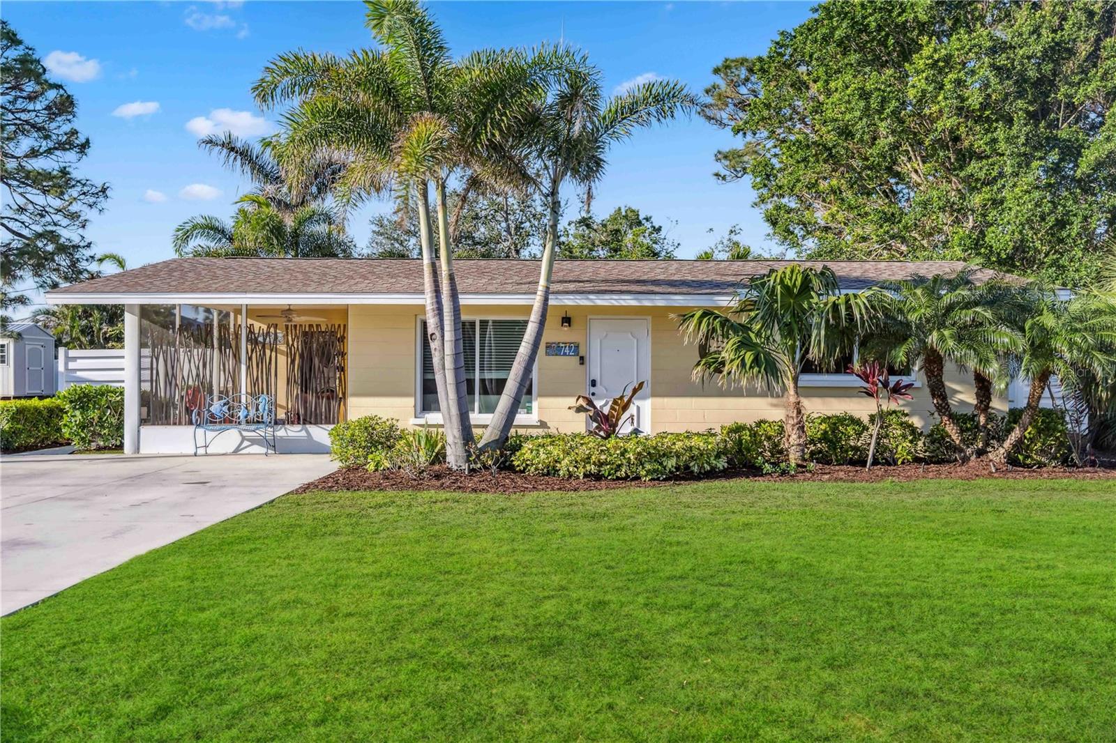 Venice Island Gem – Concrete Block Home - Remodeled & Move-In Ready! Located on Venice Island, this beautifully renovated home offers effortless coastal living in a prime location with Gulf beaches only 1.5 miles away. Best of all, this home has IMPACT WINDOWS & DOORS and is NOT in a flood zone! The charming curb appeal of this home immediately welcomes you to take a seat on the front screened-in porch to enjoy the cool breezes. Inside you'll find three bedrooms and two baths, along with a remodeled kitchen featuring white cabinetry, granite countertops and a window framing views of the lush landscape of the back patio and yard. A sun-filled Florida Room overlooking the landscaped courtyard and lanai is currently being used as a dining room but offers many options to the new owners. The private master suite, tucked away at the rear of the home, features a walk-in closet, en suite bath, and elegant French doors leading out to the screened terrace overlooking palm trees—an ideal place to rest and unwind. Two additional bedrooms share a well-appointed bath, with easy access to the main living areas. Both the primary and guest bathrooms are upgraded with stylish vanities and granite finishes. The interior laundry room, just off the kitchen, includes a built-in pantry shelf, adding extra functionality to this thoughtfully designed home. Step Outside to Your Own Private Oasis! A brand-new vinyl fence encloses the freshly planted tropical landscaping, creating a serene retreat for relaxation or entertaining. The storage shed provides the perfect space for your beach chairs, bikes, and kayaks, keeping all your outdoor gear organized. Recent Upgrades Include: Impact Windows/Doors, Renovated Kitchen, Brand New Dishwasher, Screened Enclosures, New Upgraded Electrical Panel, New Tankless Water Heater, New Culligan Water Filtration System, Built-in Murphy Bed (Guest Room), and Newer HVAC Units (1.5 & 3 years old). Owners just had all the interior doors, trim, and primary bed/bath freshly painted. 
Ideally situated near Venice’s shopping district and just minutes from the historic downtown area, this home places you steps away from the Venetian Waterway Trail, charming boutiques, top-rated restaurants, Venice Library, Performing Arts Center and vibrant live entertainment. Don’t miss the opportunity to own a slice of paradise on the Island of Venice!