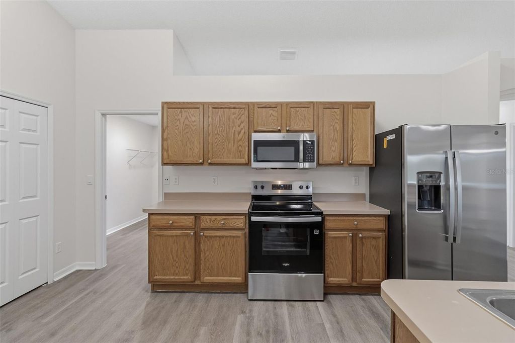 Photo of 155 SW De Gouvea Terrace, Port Saint Lucie, FL 34984 (MLS # O6353988)
