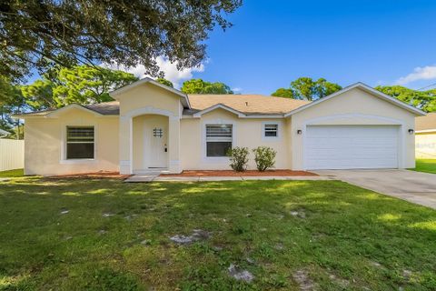 Photo of 155 SW De Gouvea Terrace, Port Saint Lucie, FL 34984 (MLS # O6353988)