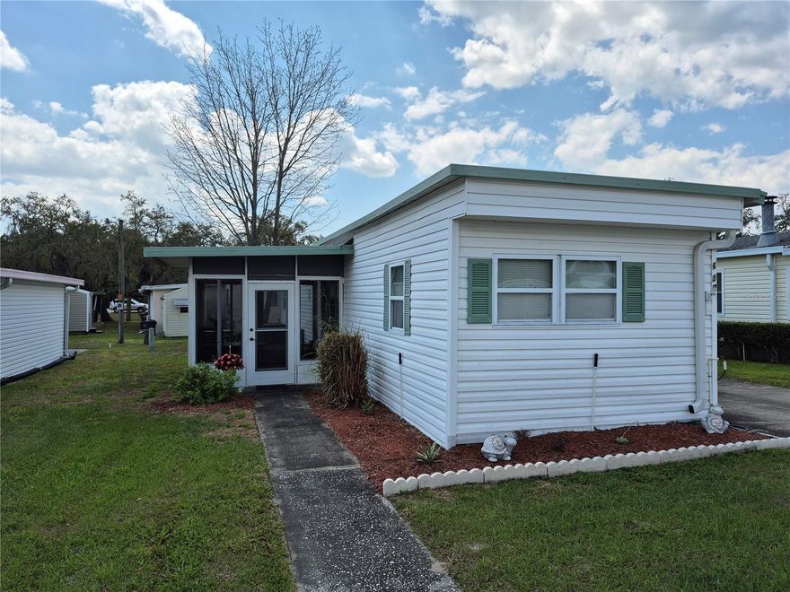 Welcome to your perfect Florida getaway in Bonfire Mobile Home Park—one of Leesburg’s sought-after 55+ resident-owned (co-op) communities in the heart of Lake County. Whether you're a snowbird looking for a seasonal retreat or ready to enjoy full-time Florida living, this fully furnished home is move-in ready and low maintenance.

This 2 bedroom, 2 bathroom manufactured home offers comfortable living room and a beautifully, tiled Florida room—ideal for morning coffee, reading a book, or simply relaxing after a day on the water.

Located along scenic Haines Creek, residents enjoy direct access to Lake Eustis, Lake Griffin, and the entire Harris Chain of Lakes—making this an ideal location for boating, fishing, and enjoying the Central Florida waterfront lifestyle.

Bonfire is a friendly, 55+ community where neighbors become friends. Heated pool, community center, shuffleboard and a secured storage area for boats and trailers at no additional cost—perfect for those bringing their Florida toys for the season.

Conveniently located near shopping, dining, medical facilities, and downtown Leesburg, this home offers the ideal blend of affordability, location, and lifestyle.

If you're searching for an affordable Florida retirement home, winter getaway, or snowbird escape in Lake County—this is it.
