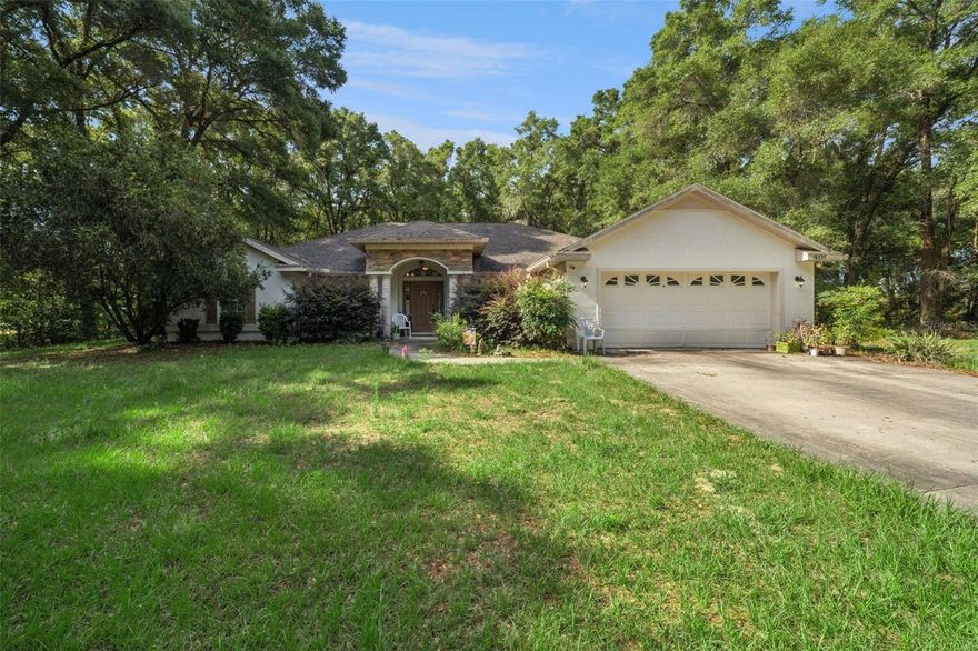 Welcome to 16230 NW 53rd Street in Morriston — a rare opportunity to own a spacious 4-bedroom, 3-bath home with 2,380 square feet of living space situated on 3 ACRES of land. Whether you’re looking to RENOVATE and personalize the existing home OR start fresh and BUILD YOUR DREAM ESTATE, this property offers endless potential.

Inside, the home features a functional and flexible layout designed for both everyday living and entertaining. A dedicated office provides the perfect space for remote work, studying, or managing household tasks, while the separate formal dining room creates an ideal setting for family dinners, holidays, and gatherings. With 4 bedrooms and 3 bathrooms, the floorplan easily accommodates family, guests, or multigenerational living.

The kitchen and main living areas are thoughtfully arranged for comfortable daily living, offering an easy flow between cooking, dining, and relaxing spaces. Additional rooms provide flexibility for a guest suite, hobby room, playroom, or extra storage.

Outdoor living is equally appealing, featuring a long driveway, a welcoming front porch, and a covered rear patio perfect for grilling, entertaining, or simply enjoying the peaceful surroundings. The property also includes a large DETACHED STORAGE BUILDING/WORKSHOP, offering ample space for tools, equipment, projects, or recreational gear.

Located in the growing Morriston area, where new development continues to expand, this property offers the privacy and tranquility of rural living while remaining conveniently connected to Ocala, Dunnellon, Williston, and other North Central Florida destinations. Enjoy the space, quiet atmosphere, and flexibility that come with country-style living while still being within reach of everyday conveniences, outdoor recreation, and major roadways.