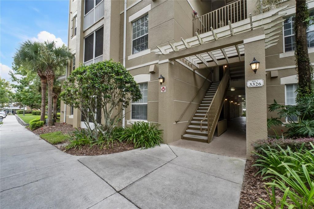 Photo of 3326 Robert Trent Jones Drive #305, Orlando, FL 32835 (MLS # O6399087)