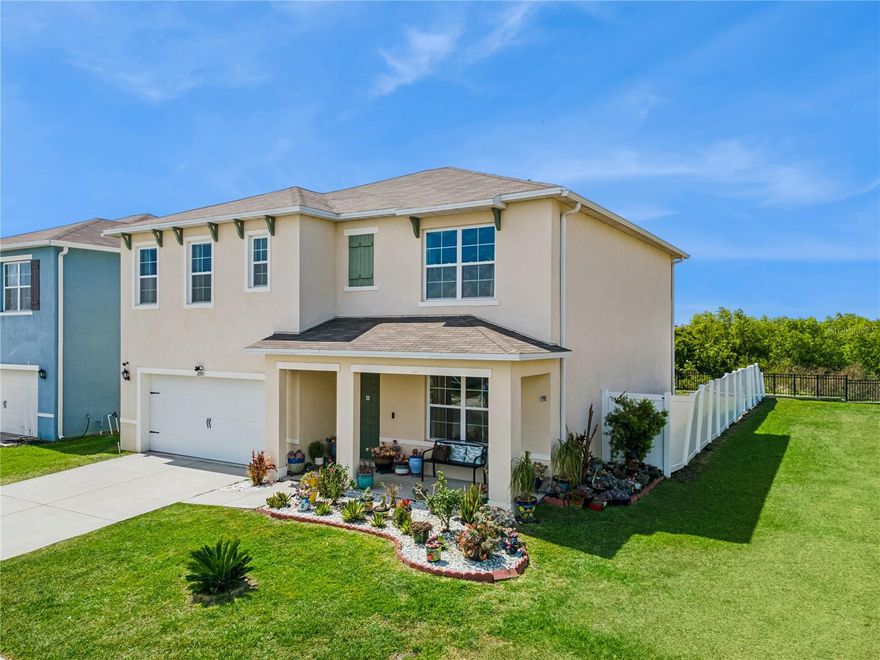 One or more photo(s) has been virtually staged. Spacious and thoughtfully designed Hayden floor plan by D.R. Horton offering over 2,600 sq ft, 5 bedrooms, 3 full bathrooms, and a 2-car garage in a growing Lakeland location.

This two-story home features all concrete block construction on both floors and a versatile open-concept layout ideal for modern living. The first floor includes a flex space perfect for a home office or formal dining, along with a guest bedroom and full bath, ideal for visitors or multi-generational living.

The kitchen is the heart of the home, showcasing a large center island, walk-in pantry, stainless steel appliances, and abundant cabinetry, all overlooking the spacious living and dining areas with access to the backyard.

One of the standout features of this property is its added privacy—there is no immediate neighbor on one side, creating a more open feel and additional separation rarely found in similar homes.

Enjoy peaceful outdoor living with a backyard water view, offering a serene setting with no rear neighbors directly behind—perfect for relaxing evenings or entertaining.

Upstairs, the expansive primary suite offers a private retreat with en-suite bath and walk-in closet. A large loft provides additional living space, complemented by three secondary bedrooms, a full bathroom, and a convenient upstairs laundry room.

Additional features include smart home technology, generous storage throughout, and a functional layout designed for flexibility and comfort.

Conveniently located near major roadways, shopping, dining, and everyday amenities, this home offers both space and a unique combination of privacy and natural views.