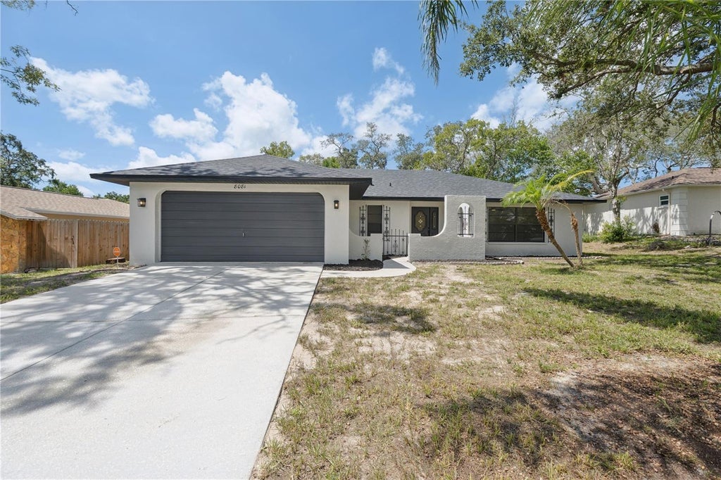 Photo of 8081 Wooden Drive, Spring Hill, FL 34606 (MLS # TB8530770)