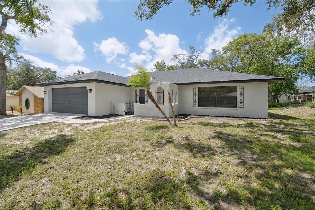 Photo of 8081 Wooden Drive, Spring Hill, FL 34606 (MLS # TB8530770)