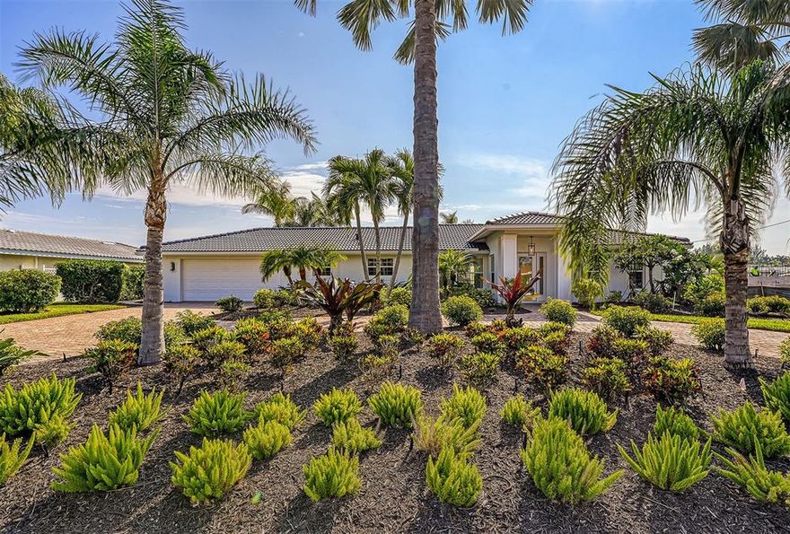 Just completed! Sparkling full renovation of this this Emerald Harbor jewel spared no expense.  Enjoy bright spacious rooms with breezes from one of the widest canals on Longboat. Wolf and Sub-Zero appliances, designer lighting and plumbing fixtures throughout, beautiful quartz countertops with a massive kitchen island, all marble bathrooms, wood floors throughout, new pool deck and refinished pool, brand new seawall, dock, and lift – THIS HOUSE IS A BOATER’S DREAM! The wide canal at this location magnifies views and affords better privacy than most canal front locations.  You won’t want to work from this home, but if you must then you will enjoy the dedicated office with extensive built ins and storage.  Perfect location with proximity to all the best dining and recreation the north end has to offer.  Deeded beach access is the cherry on top of this unrivaled opportunity to start enjoying your coastal Florida lifestyle!