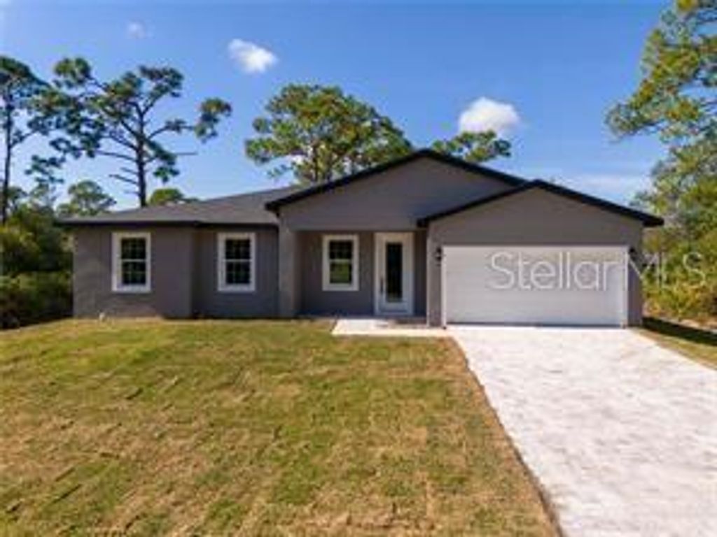 Photo of 49 Santa Fe Street, Port Charlotte, FL 33953 (MLS # O6399544)