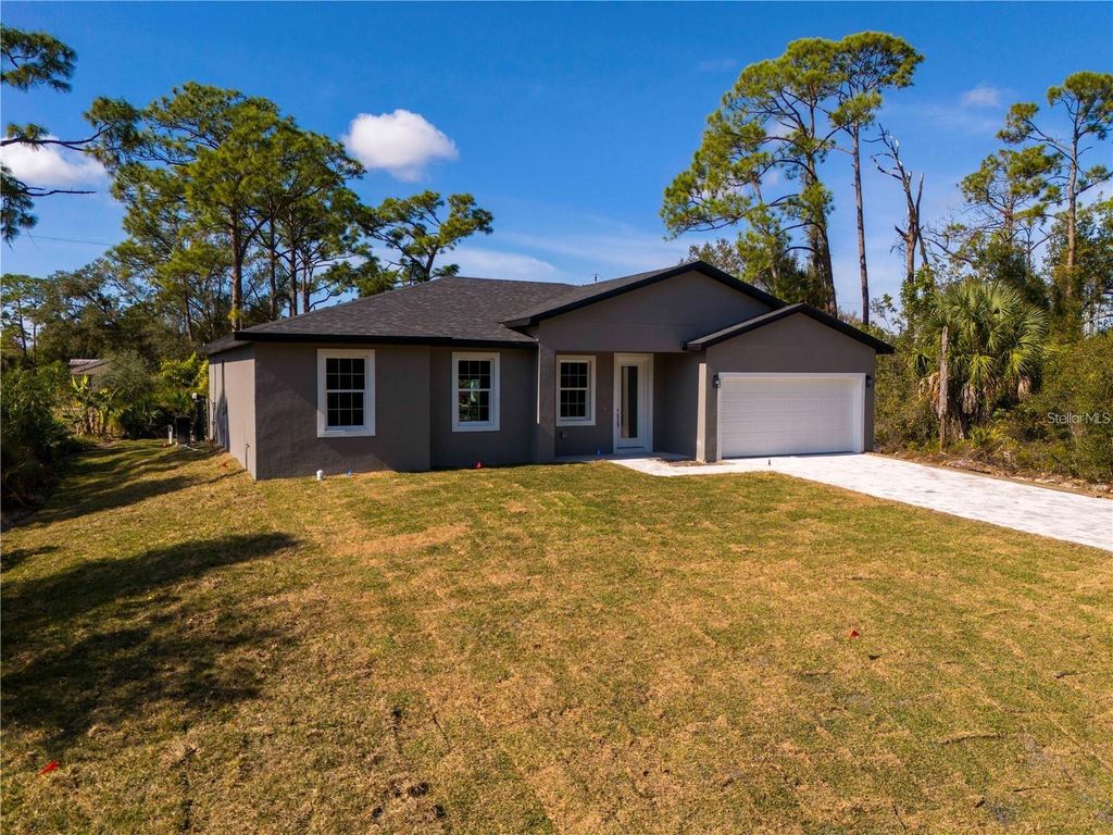 Photo of 49 Santa Fe Street, Port Charlotte, FL 33953 (MLS # O6399544)