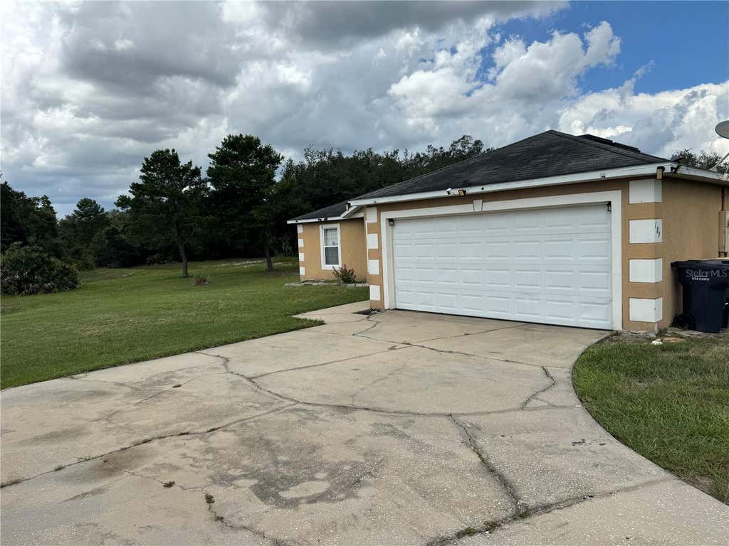 Photo of 609 Kissimmee Lane, Poinciana, FL 34759 (MLS # O6435205)
