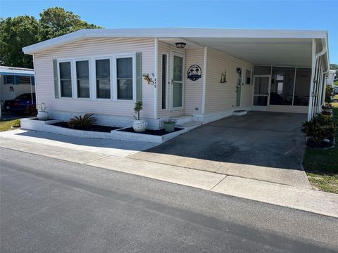 Photo of 825 Coconut Palm Street, Largo, FL 33778 (MLS # TB8374519)