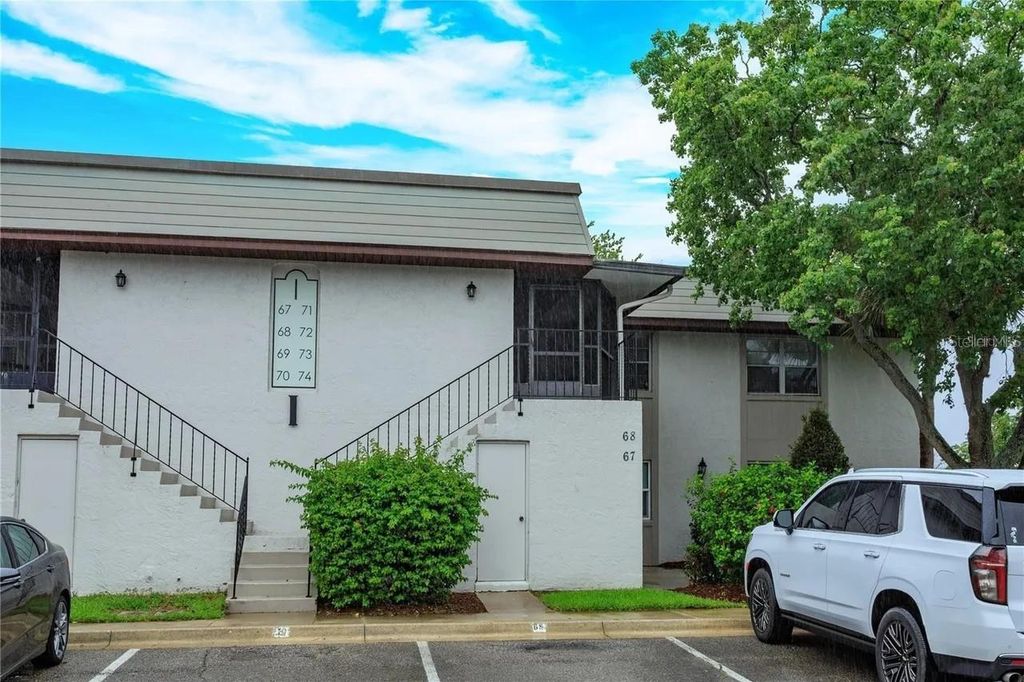 Photo of 68 Windtree Lane #201, Winter Garden, FL 34787 (MLS # O6351273)