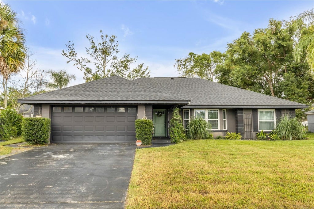 Photo of 519 Birchwood Lane, Deltona, FL 32738 (MLS # O6446268)