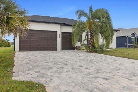 Photo of 15381 Alsask Circle, Port Charlotte, FL 33981 (MLS # OM721153)