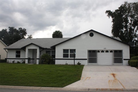 Photo of 26245 Newcombe Circle, Leesburg, FL 34748 (MLS # S5156558)