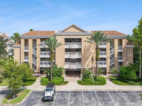 Photo of 7651 Whisper Way #204, Reunion, FL 34747 (MLS # O6437544)