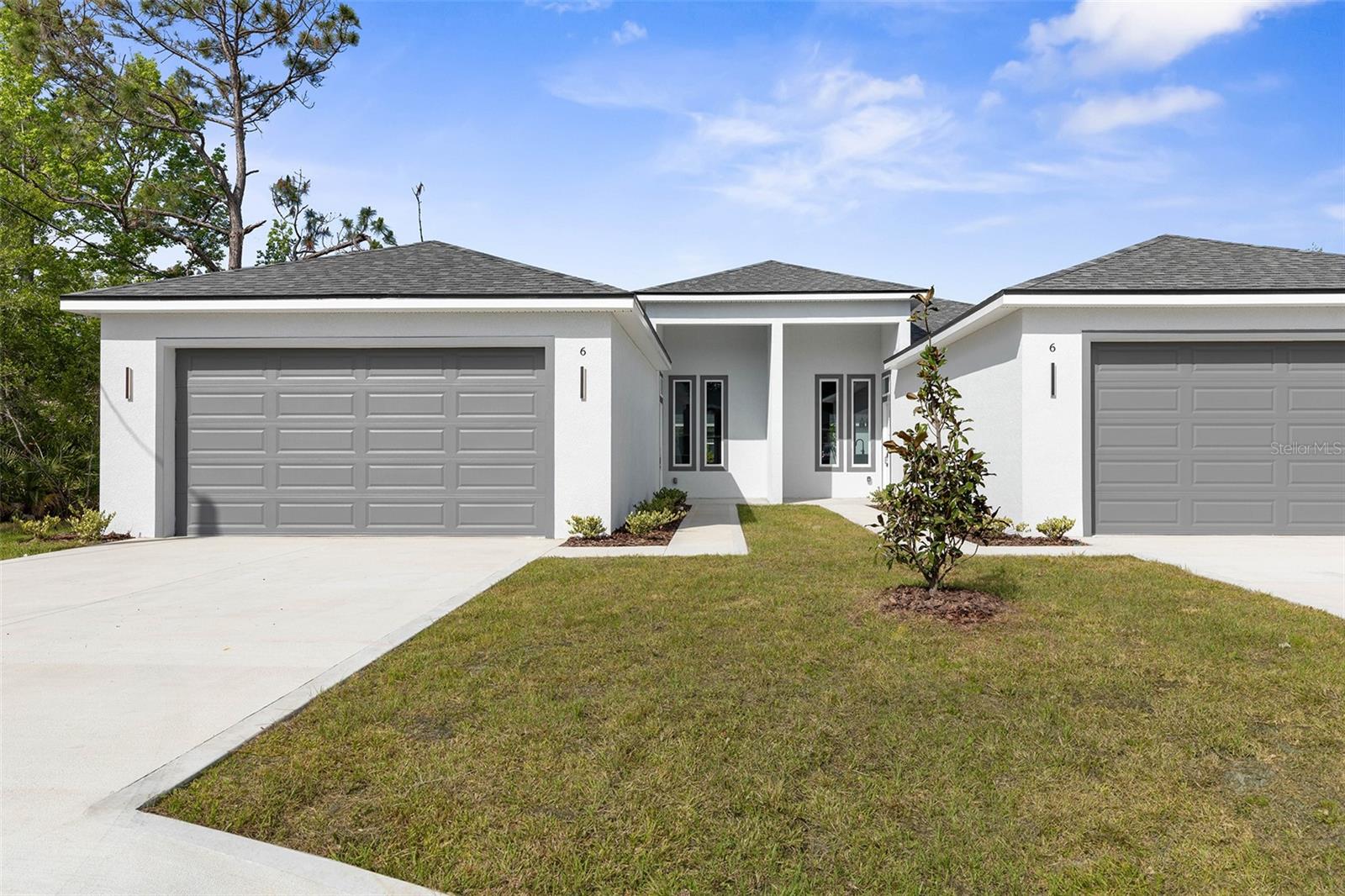 Revel in the serene charm of 6 Seton Place, Unit A, a delightful duplex nestled in the heart of Palm Coast, FL 32164. This spacious 1,368 sq ft home offers three inviting bedrooms, perfect for family gatherings or a peaceful retreat. With two full bathrooms, you'll enjoy the convenience and comfort needed for modern living. Step inside to discover a well-designed layout that maximizes space and natural light, creating a warm and welcoming atmosphere. The property is situated in a tranquil neighborhood, providing a peaceful oasis while still being close to local amenities. Imagine mornings spent sipping coffee on your private patio, surrounded by lush greenery. The open-plan living area is ideal for entertaining guests or enjoying quiet nights in. Each room is thoughtfully designed to provide comfort and style, making it easy to settle in and feel right at home. Whether you're a growing family or seeking a retreat, this duplex offers a perfect blend of comfort and convenience. Don't miss out on the opportunity to make this charming property your next home sweet home.