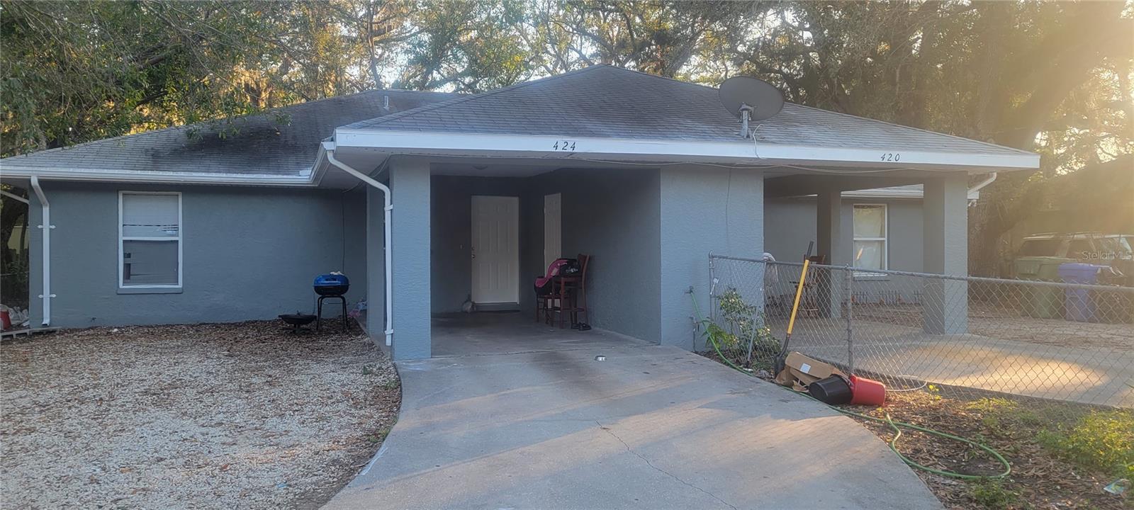 Welcome to 420 / 424 11th Avenue E Bradenton, an excellent investment opportunity with current strong income stream. This is a CBS built duplex with three bedrooms and two bathrooms on each side. No HOA fees or flooding worries in this location. The units are fully rented on annual leases, with potential for further increases of income. There are recent A/C systems, paint and tile floors throughout. Each unit has a single carport, storage unit, rear porch, laundry room and fenced tree shaded yard. Central location with close proximity to downtown shopping, river walk, Manatee hospital and parks. This is a solid rental income property to be added to your rental portfolio and can be purchased with a second duplex at 319 / 321 11th Avenue E. MLS #A4654594. Call for info today. Agent is property Owner.