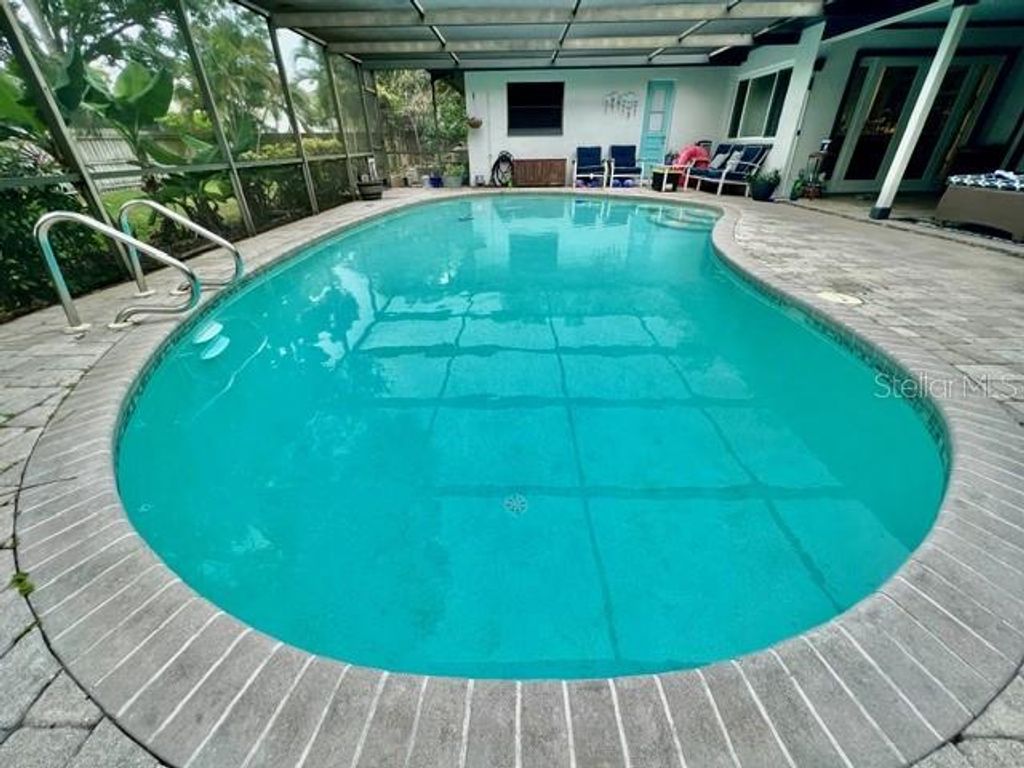 Photo of 834 Hillside Drive, Palm Harbor, FL 34683 (MLS # TB8487848)