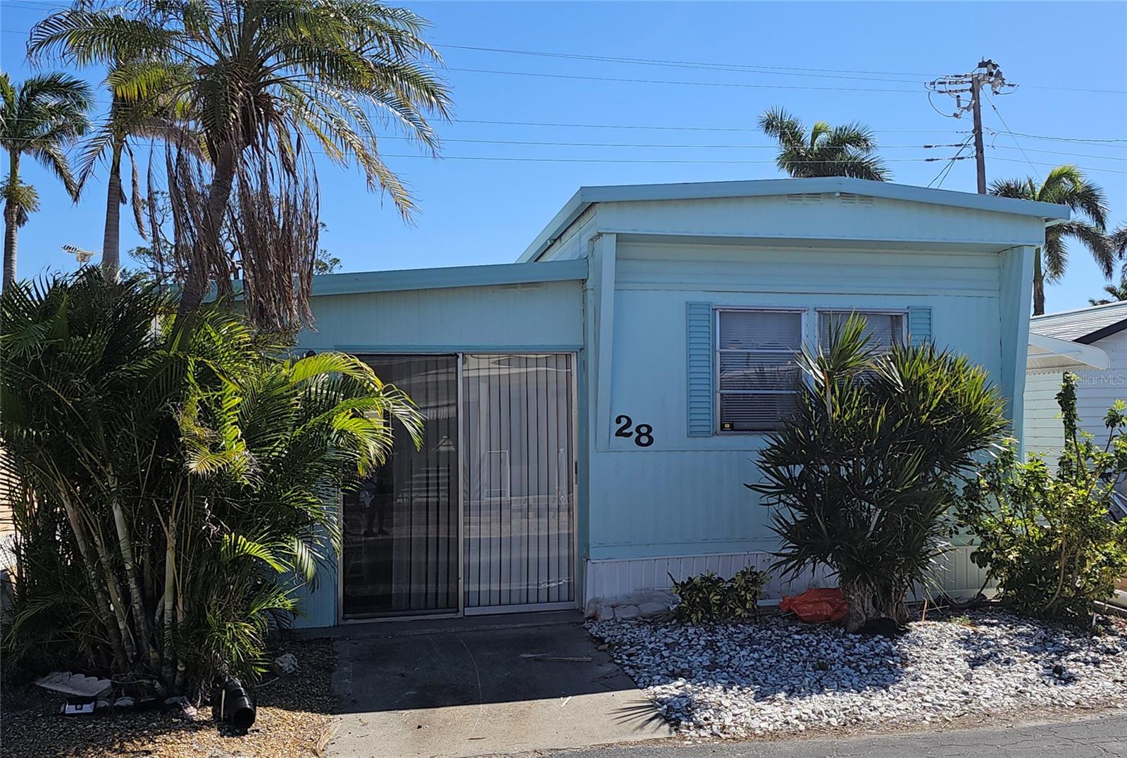 Welcome to your slice of paradise in the highly sought-after 55+ community of Paradise Bay Estates! This delightful 1BR/1BA home features a versatile Florida room with a small closet—perfect for accommodating overnight guests. The one-car carport provides easy access from the main street in the rear, and you'll love the two storage sheds for all your beach toys, bikes, and tools. One shed even includes a washer/dryer hookup for added convenience.
Offered completely turnkey and move-in ready, this home is designed for comfort and ease. The main bedroom currently features twin beds but could easily accommodate a king-sized bed if preferred. Plus, a brand-new split system heat/AC was installed in December 2024 after the home received a refreshing update post-hurricanes Helene & Milton.
Paradise Bay Estates is an active and vibrant community with fantastic amenities, including a heated pool and spa, pickleball courts, shuffleboard, a boat ramp, and available boat dockage (waitlist applies). There’s always something happening—from potlucks and musical shows to golf outings, community lunches, and music by the bay. Nestled along the picturesque shores of Sarasota Bay, residents enjoy stunning wildlife, charming gazebos, and breathtaking sunsets over Anna Maria Island and Longboat Key.
Don’t miss this opportunity to enjoy the Florida lifestyle in a premier waterfront community!