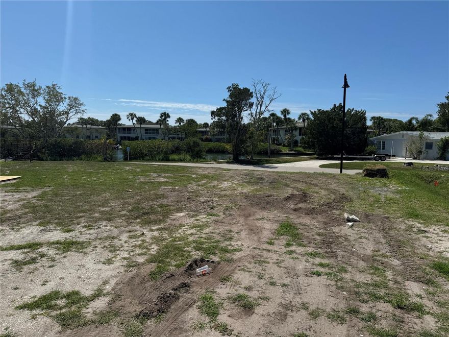 This lot is located in The Preserve at Longbeach, an exclusive enclave of 12 new homes, light filled and luxurious contemporary homes. Refinement meets relaxation at the north end of LBK in Longbeach Village - where beach-to-bay access with waterfront amenities, al fresco dining, multiple kayak launch points, a neighborhood boat dock and ramp, and a free-spirited lifestyle await. Exhale and enjoy a neighborhood where the waterfront is at your fingertips and peacocks walk the streets. All that makes Coastal Florida living so enchanting is yours to enjoy here - be one of only 12. Located a short distance from the public beach access, the tranquil beaches of Longboat Key are yours to enjoy whether going for a swim in warm, Gulf waters, walking the beach or enjoying the sunset. Whether by boat or car, you're only minutes from world-class dining and shopping, a host of cultural amenities, and nearby barrier islands.
