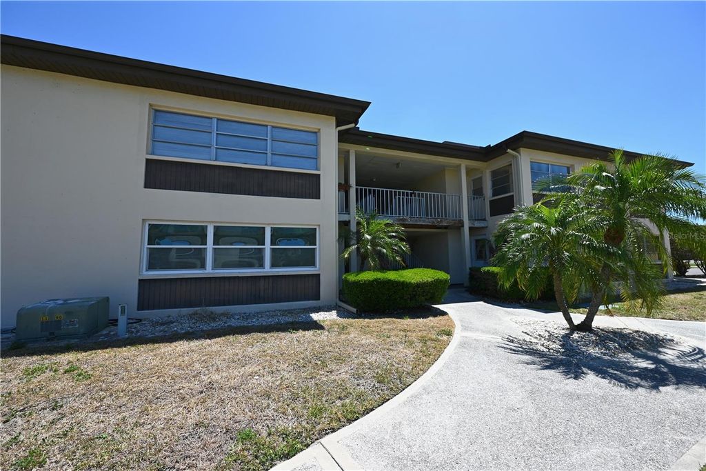 Photo of 4600 Marine Parkway #105, New Port Richey, FL 34652 (MLS # TB8502456)