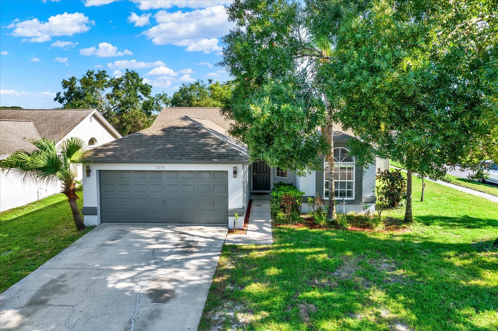 Welcome to this delightful, recently remodeled 3-bedroom, 2-bathroom home with a 2-car garage, located in the highly desirable Fawn Ridge community. Move-in-ready with a brand NEW AC (2025), fresh interior and exterior paint (2025), newer water heater (2020), and updated kitchen and bathrooms (08/2025). Perfectly situated on a corner lot with a low HOA, no CDD, and no flood insurance required, it’s truly a rare find in this location. Inside, you’ll love the vaulted ceilings and an open floor plan with an abundance of natural light throughout. The recently updated kitchen showcases beautiful quartz countertops, brand new cabinetry, stainless steel appliances, and a cozy eat-in space. Durable, easy-to-maintain flooring nicely flows throughout the main living areas. The split-bedroom floor plan ensures both privacy and comfort. The owner’s suite features an updated en-suite bathroom with quartz countertops, dual sinks, and a large walk-in shower, while the second bathroom has also been stylishly updated. Sliding doors off the living room lead to a fully fenced backyard, ideal for year-round outdoor living and entertaining. Fawn Ridge is a family friendly neighborhood within the sought-after Westchase area of Tampa (33626). Residents enjoy highly rated schools, and amenities including tennis courts, basketball court, a baseball field, picnic pavilion, and playground. The location is unbeatable - close to shopping, fine dining, bike trails, medical facilities, Tampa International Airport, Downtown Tampa, St. Pete, Clearwater, and Florida’s award-winning Gulf Coast beaches! Don’t miss out on this incredible opportunity - you’re going to love this home!