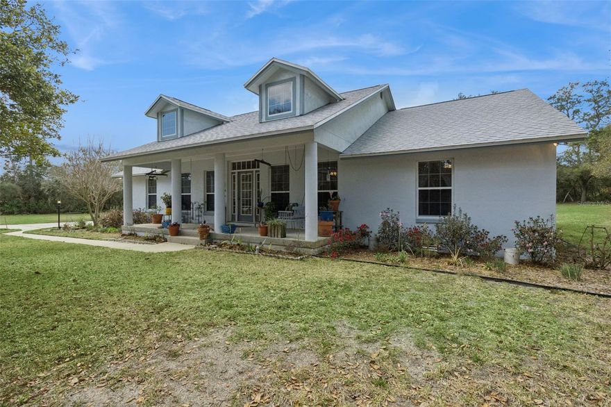 Discover this rare opportunity to own a custom-built estate set on 1.57 private acres in a peaceful rural setting. Designed with intention and built in 2000, this 3-bedroom, 2.5-bathroom residence offers 2,073 square feet of refined living space that blends comfort with craftsmanship. A new roof installed in 2023 and a whole-home generator added in 2025 provide both confidence and long-term value. The home also features a crawlspace foundation that houses the plumbing and electrical systems, offering easier accessibility for maintenance, service, and future upgrades.
The detached 30 by 30 three-car workshop garage offers exceptional space for vehicles, collections, or hobbies, while the expansive grounds allow room to park an RV or boat directly on your own property. A dedicated potting shed adds charm and flexibility for those who appreciate outdoor living. With low HOA restrictions and convenient access just 30 minutes to downtown Eustis and 30 minutes to downtown DeLand, along with proximity to Mount Dora’s shops and dining, this property delivers privacy, presence, and convenience in one impressive package. If you are ready for space, security, and the distinction of a custom home, schedule your private showing today.