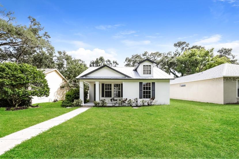 Welcome Home! Don’t miss this incredible opportunity to own a beautifully updated 3-bedroom,
2-bathroom home with a 1-car garage—and best of all, no HOA or CDD fees! From the moment you
arrive, you’ll love the spacious front porch—perfect for morning coffee or unwinding in the evening. Step
inside and you’ll immediately appreciate the bright, open-concept design that seamlessly connects the
expansive living room, dining area, and kitchen—an ideal layout for both everyday living and entertaining
guests. The newly updated kitchen is a true showstopper, featuring quartz countertops, stylish cabinetry,
stainless steel appliances, a breakfast bar for casual dining, and a generous pantry for extra storage. Just
beyond the dining space, sliding glass doors open to your own private backyard retreat—complete with a
screened-in patio, sparkling pool, and relaxing spa. Whether you’re hosting friends or enjoying a quiet
evening, this outdoor oasis is sure to impress.Need a little extra space? The versatile den/office can
easily serve as a 4th bedroom. The spacious primary suite offers comfort and style with a large walk-in
closet and a refreshed ensuite bathroom featuring a dual-sink vanity and walk-in shower. Additional
upgrades and highlights include: Brand-new HVAC system for year-round comfort, new LVP flooring and
carpet throughout, fresh interior and exterior paint, refreshed bathrooms, new pool pump, durable
metal roof for peace of mind, spacious indoor laundry room, garage access via alley entry. All of this in a
prime location—just a short walk to Largo Public Library, Largo Central Park, and Highland Recreation
Center, with easy access to Tampa and the world-famous Gulf beaches. This move-in-ready home has it
all—style, comfort, and location. Schedule your private showing today and make this home your own!