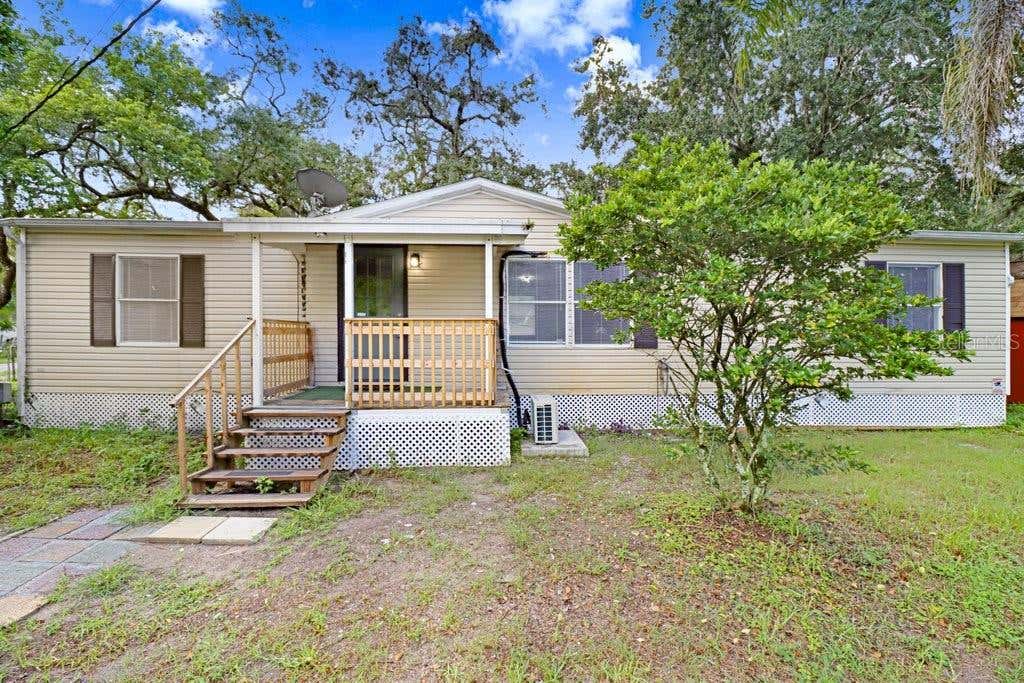 Photo of 12610 Alemedo Avenue, New Port Richey, FL 34654 (MLS # TB8540766)