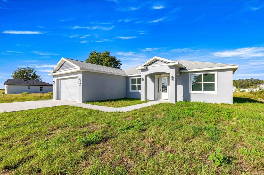 Photo of 12390 SE 106th Court, Belleview, FL 34420 (MLS # OM711204)