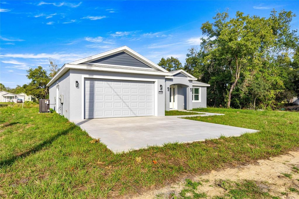 Photo of 12390 SE 106th Court, Belleview, FL 34420 (MLS # OM711204)