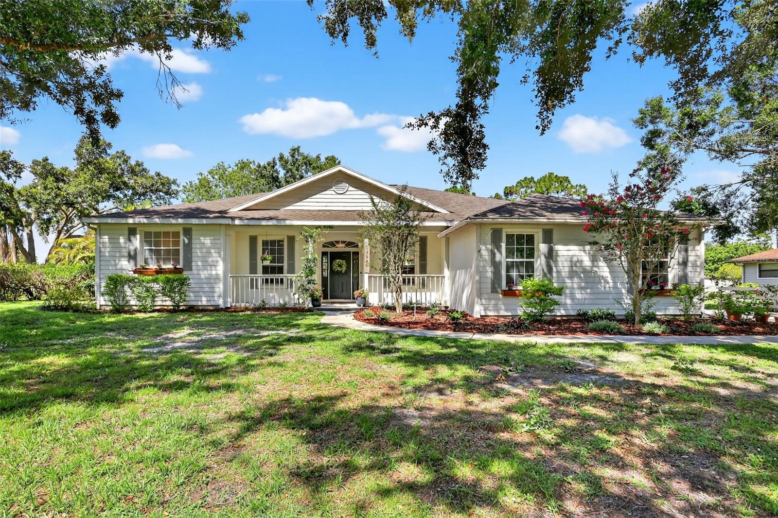 Welcome to this beautifully updated pool home situated on a full acre in the highly desirable Mill Creek community. This spacious residence offers 4 bedrooms, 2 bathrooms, a dedicated office, and a versatile bonus room—providing plenty of space for the whole family. The home features a long list of recent upgrades, including a fully renovated kitchen with modern finishes, new French Oak engineered hardwood flooring throughout all living areas, a brand-new HVAC system installed in September 2024, and a new septic system replaced in 2021. The floorplan was thoughtfully reconfigured to create a true fourth bedroom, and a pool heater was added in 2021 to extend your swimming season. Outside, you'll find ample space for your boat or RV, along with room to enjoy the peaceful, expansive yard that Mill Creek is known for. This is a rare opportunity to own a move-in ready home with acreage, privacy, and style—don’t miss it!