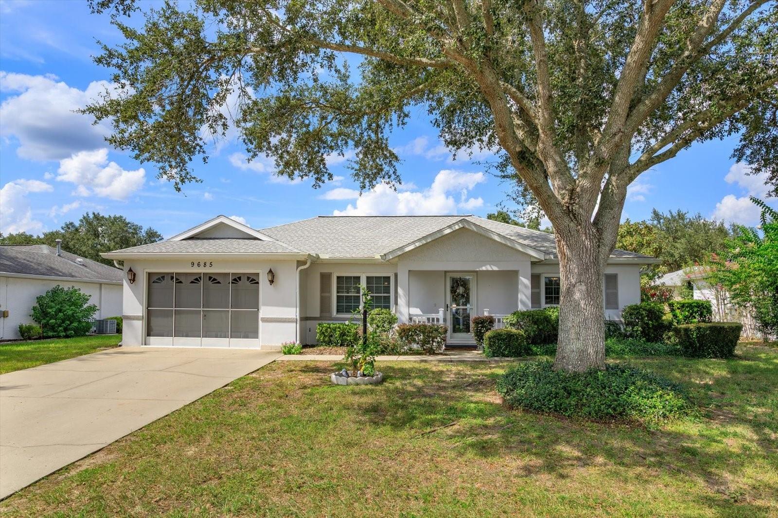 This cute Single Family home is located in the beautiful 55+ community of On Top of the World. This home has great features, a large kitchen with newer cabinets and solid surface counter tops, a gas range, a built in pantry and room to add an island, or have room to dance in the kitchen! There is an entry door to the attached garage, which is huge! The garage is a 2 car, but there is room to park a golf cart, plus additional storage. The garage has access to the newly completed Florida Room at the rear of the home. The primary bedroom has a walk in closet and ensuite bathroom with shower. The 2nd bedroom and bathroom are across the small hallway. The Living Room/Dining Room combination offers a large space to arrange to your liking. There is a small Florida room off of the Living Room, and attached is a brand new, larger Florida Room with access to a pave stone patio and fenced backyard. This home has been nicely updated and worth seeing for all the features!