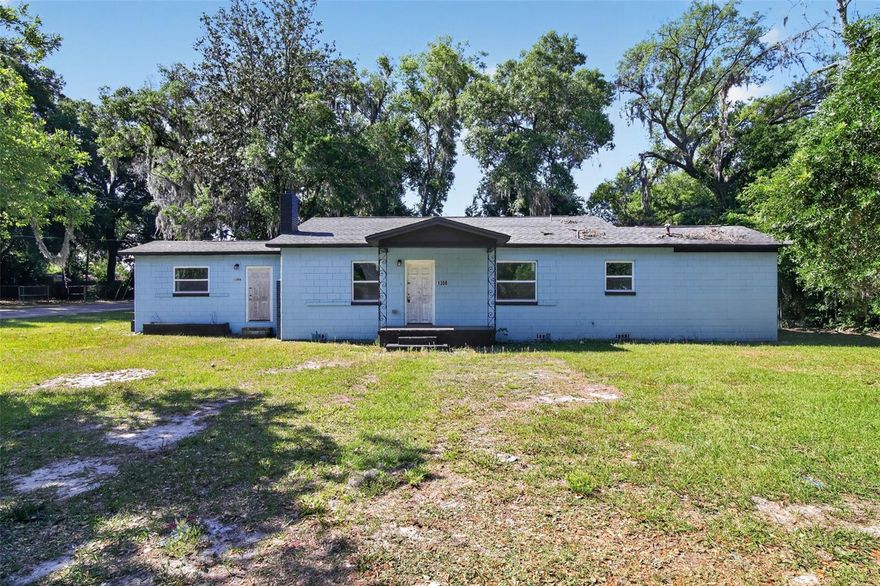 Beautiful block home on a 0.Beautiful block home on a 0.23-acre corner lot in established Ocala — minutes to downtown, the courthouse, shops, and restaurants. This 3-bedroom, 2-bath residence has been thoughtfully updated with new luxury vinyl plank flooring, fresh paint throughout, a refreshed kitchen with stainless appliances and granite-look counters, and two beautifully tiled bathrooms featuring stone-look surrounds, hexagon mosaic accents, and modern fixtures. First-time buyers will appreciate the move-in-ready condition, low-maintenance block construction, fenced areas, mature shade trees, and walkable proximity to everything downtown Ocala has to offer. Investors take note — strong rental potential in a high-demand location close to the courthouse and city core. No HOA. X flood zone. Sold as-is — schedule your showing today.