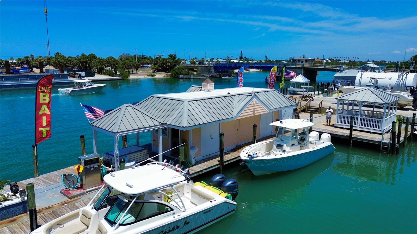 Experience the ultimate in convenience, service, and waterfront lifestyle with this exceptional marina offering dry boat storage racks in a prime location along the Intracoastal Waterway. Whether you’re an avid angler, weekend cruiser, or simply love life on the water, this marina is designed to make boat ownership effortless and enjoyable.
Features and Amenities:
   •   Fuel Savings: Enjoy discounted gas/fuel rates exclusively for rack owners.
   •   Top-Tier Boat Care: Every time your boat is hauled out, engines are flushed and the exterior is rinsed—keeping your vessel in top condition without lifting a finger.
   •   Unlimited Daily Access: Take your boat out as often as you like with unlimited daily in-and-out service.
   •   Convenient Work/Wash Racks: Equipped with water and electricity, perfect for cleaning, maintenance, or prepping for your next outing.
   •   Easy Scheduling: Use a simple phone app to schedule your boat movements—fast, efficient, and hassle-free.
   •   Angler-Friendly Amenities: Clean your catch at the covered fish cleaning station complete with running water.
   •   Relax and Socialize: Unwind at the gazebo overlooking the ICW, a perfect spot to watch the boats go by or enjoy holiday boat parades and marina-hosted social gatherings.
   •   Streamlined Gear Access: Use the provided ramps and carts for easy loading/unloading of your boating equipment.
   •   No Trailer Needed: Say goodbye to trailering—your boat stays dry, secure, and ready at your convenience.
   •   On-Site Maintenance & Repairs: Keep your boat running smoothly with in-marina repair and maintenance options.
   •   Prime Location: Just minutes from the beach and in the heart of a vibrant boating community.
This is more than a place to store your boat—it’s a full-service waterfront lifestyle. Whether you’re looking to invest or enjoy, this marina offers unmatched value and community appeal.