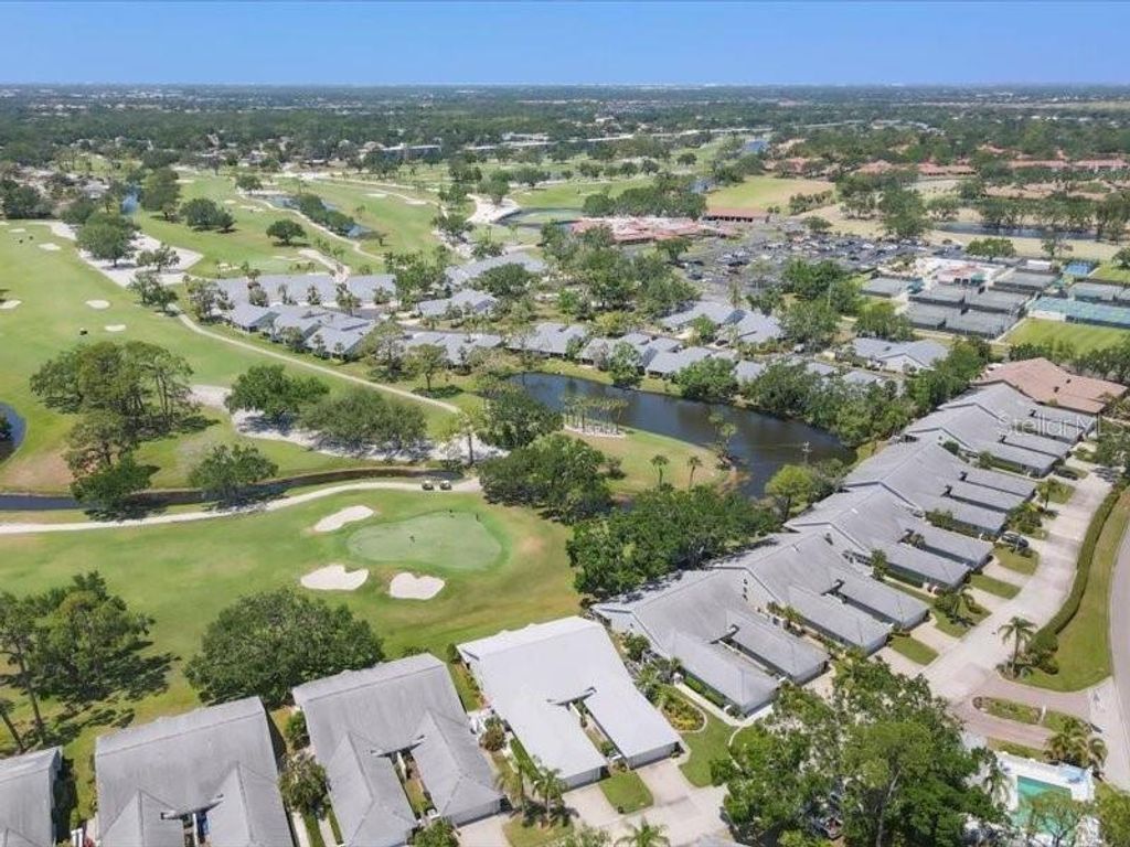 Photo of 7724 Palm Aire Lane, Sarasota, FL 34243 (MLS # A4649627)