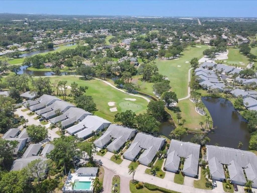 Photo of 7724 Palm Aire Lane, Sarasota, FL 34243 (MLS # A4649627)