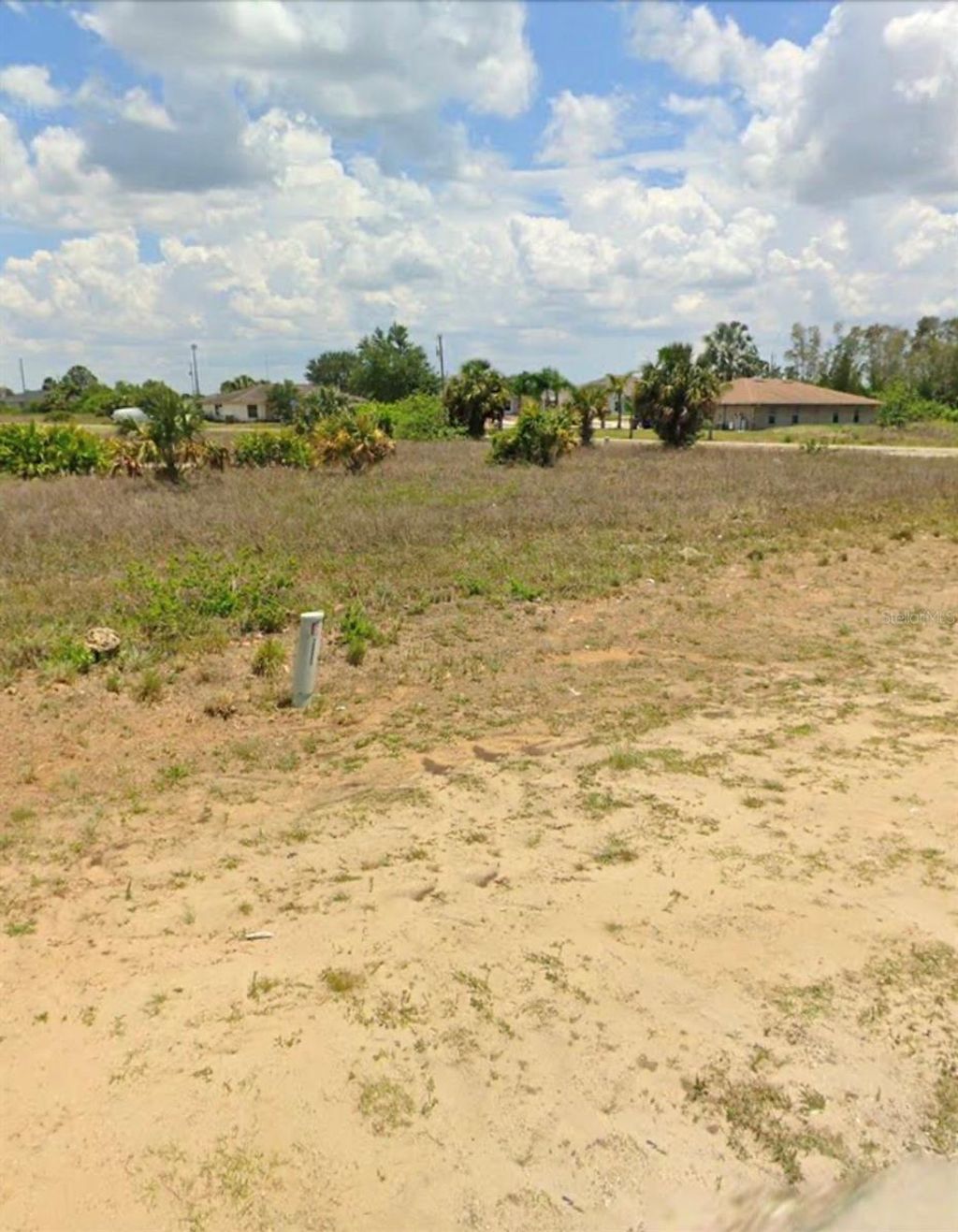 Photo of 1119 Harvest Avenue, Lehigh Acres, FL 33974 (MLS # TB8335928)