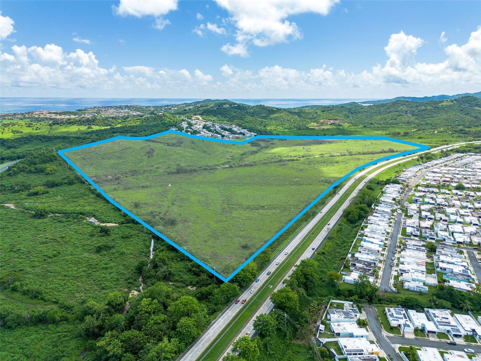Located in the vibrant region of Humacao, PR, this prime 135-acre parcel offers an exceptional development opportunity. Positioned along PR-906 and near alongside PR-53, Parcela K is strategically situated just minutes from Palmas del Mar resort community. This proximity to Palmas del Mar enhances the property's appeal, providing future residents with easy access to world-class amenities including golf courses, marinas, beaches, and fine dining. Zoned for Residential Intermediate (R-I), this land is perfect for residential development.
Humacao is a thriving municipality on the island's eastern coast, known for its picturesque landscapes, beautiful beaches, and vibrant community. The region is well-connected by major highways, making it convenient for travel to and from San Juan and other key areas of Puerto Rico. Additionally, Humacao hosts a variety of local businesses, schools, and healthcare facilities, providing a well-rounded living environment for residents. The combination of natural beauty, luxury amenities, and practical conveniences makes Parcela K an attractive development opportunity in a highly sought-after area.