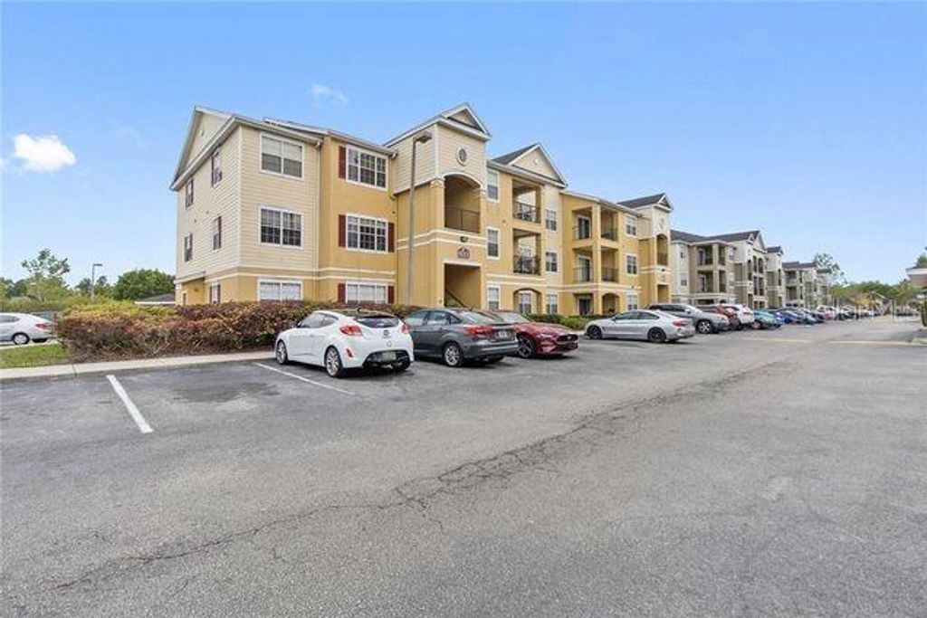 Photo of 8124 Claire Ann Drive #305, Orlando, FL 32825 (MLS # O6419270)