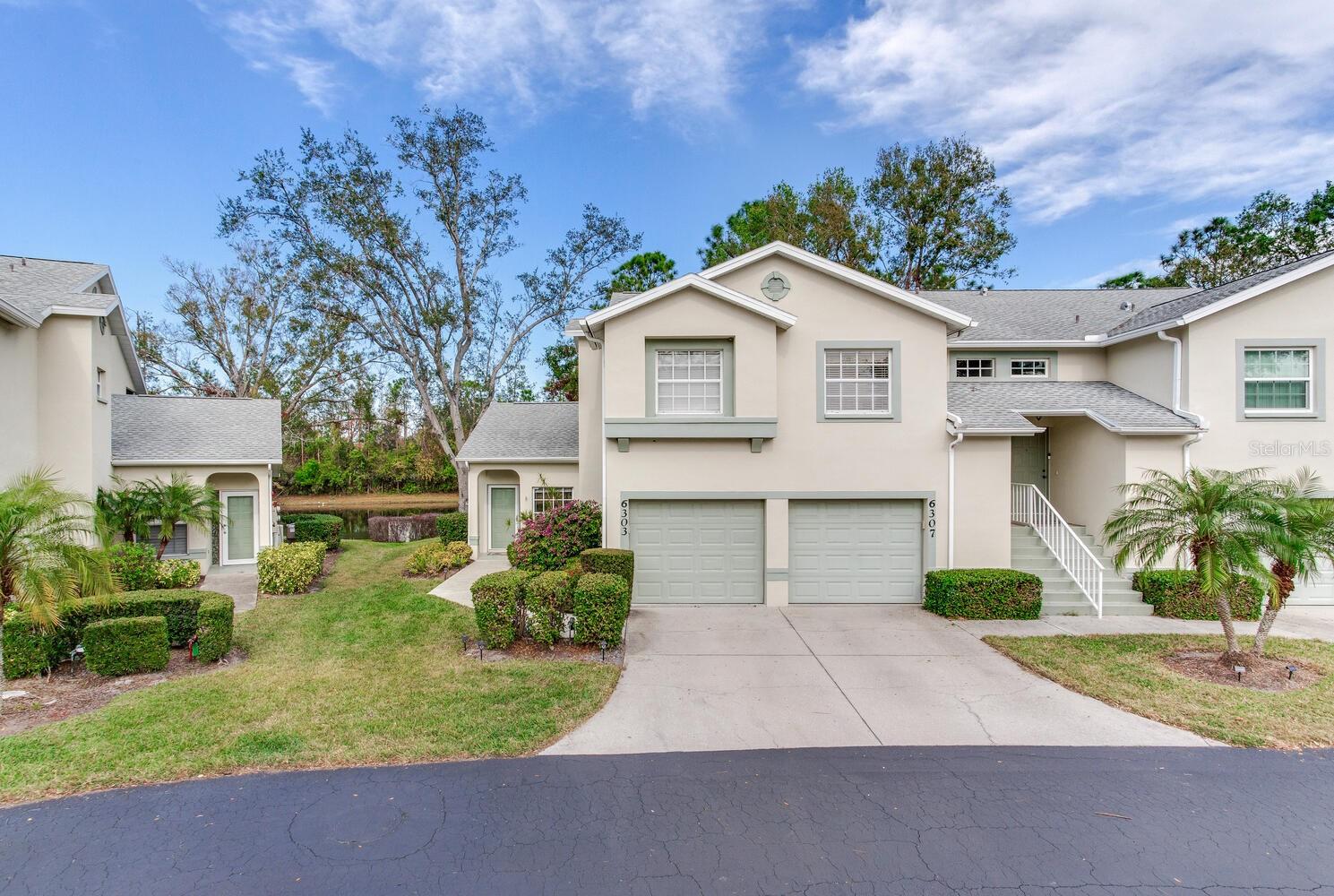 One or more photo(s) has been virtually staged. Gorgeous Lakefront Condo with Transferable Golf Membership and Pet-Friendly Living!
Experience a blend of luxury, convenience, and resort-style amenities in this stunning, pet-friendly, ground-floor villa condo! Featuring 2 spacious bedrooms, 2 baths, and lake views from every room, this home offers a unique opportunity to enjoy Florida living at its finest.
The Transferable "Class A" Golf Membership to Tara Golf and Country Club is included, giving you and your guests full access to the private 18-hole golf course, elegant clubhouse with fine dining, grill room, and award-winning brunches making this villa a true gem for golf lovers!
Property Highlights:
New Roof underway with no special assessment
Master suite with walk-in closet, a large vanity, and a cozy sitting area
Private entrance and attached garage for easy access and added privacy
Vaulted ceilings, a screened-in lanai, and stylish wood and ceramic tile floors, custom light fixtures
Central air conditioning, high-speed WiFi, washer, dryer, and fully equipped kitchen with brand-new stove
Community & Club Amenities:
Heated pool with concession stand, hot tub, driving range, putting green
Upcoming new covered pavilion with 5 pickleball courts, tennis, bocce, and fitness center with sauna
Daily social activities for a lively, connected lifestyle
Plus, you're just steps from the Plantation Gardens community heated pool and only one exit away from top shopping spots, pristine beaches (Siesta Key, Anna Maria Island), St. Armands Circle, and vibrant dining and entertainment in the Bradenton/Sarasota area. At only 15 minutes from Sarasota Bradenton International Airport, this villa offers a pet-friendly, resort-style lifestyle you won't want to miss!
