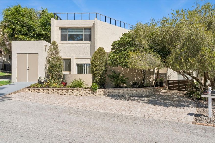 This unique townhome offers a rare opportunity to own a modern residence that lives like a single family home where you OWN THE LAND and is built with CONCRETE AND BLOCK construction. Featuring 3 BEDROOMS and 3 FULLY REMODELED BATHROOMS, this home was completely renovated in 2012 with NEW PLUMBING, UPDATED ELECTRICAL PANEL, and HIGH QUALITY FINISHES throughout, and has been beautifully maintained and RECENTLY PAINTED, preserving its modern feel. Enjoy PORCELAIN, WOOD, AND STONE FLOORS, IMPACT WINDOWS AND DOORS, ELECTRIC BLINDS, NEW CLOSET AND PATIO DOORS, an ELECTRIC FIREPLACE, HOME THEATER SOUND SYSTEM, WATER PURIFICATION SYSTEM, and a TANKLESS WATER HEATER providing ENDLESS HOT WATER. The outdoor living is exceptional with 3 PRIVATE SPACES including a FIRST FLOOR TERRACE, SECOND FLOOR TERRACE, and a PRIVATE ROOFTOP with OPEN VIEWS and NO DIRECT FRONT OR REAR NEIGHBORS, offering rare privacy. HOA is ONLY $208 QUARTERLY, making it both AFFORDABLE and FLEXIBLE for financing. Unique, stylish, and move in ready.