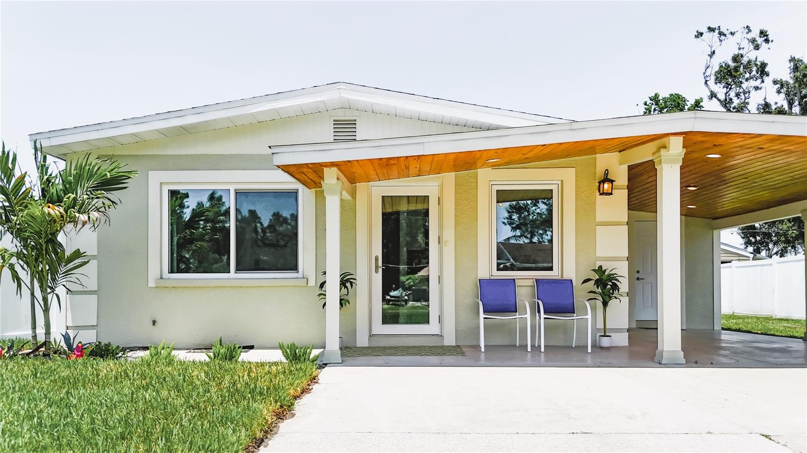 Discover the peace and tranquility of Bay View Park, located within biking distance of Publix, Terra Ceia Bay, Snead Island, and the Bradenton Yacht Club. Only 2.5 miles to beautiful Emerson Point Preserve with its hiking trails, canoe and kayak launches, fishing piers, observation towers, and the Tocobaga culture mounds from around 700 AD. Bright and open floor plan, this 3-bedroom home is a modernized wonder of comfort and care. Hurricane Impact-9 windows and doors were installed in 2024. The roof and AC were new in 2020. Exceptional curb appeal with modern landscaping and solid wood undercanopy with recessed lighting above the carport and front porch. The generous extended driveway provides plenty of parking. Step inside and be greeted by the beautifully remodeled kitchen featuring quality cabinets, granite countertops, and stainless steel appliances. All walls and ceilings are textured and freshly painted. The bath was also renovated, and PVC pipes were installed with a new county water meter. Enjoy the carefree luxury of ceramic plank tile flooring throughout. Exit to the backyard and set up your BBQ on the new paver patio. Put a fire pit, pool, garden, or gazebo area in the round. The convenient laundry room features an electric water heater and a modern washer and dryer. There's a reclaimed water system for all your exterior watering needs for a $15 fixed monthly fee with no extra usage charges. Room for all your toys, so bring your boat or RV through the double gate at the side of the house. Everything has been done, and with a successful inspection performed in June 2025, you can put your feet up and live the Florida lifestyle worry-free and with lower insurance costs. No HOA.