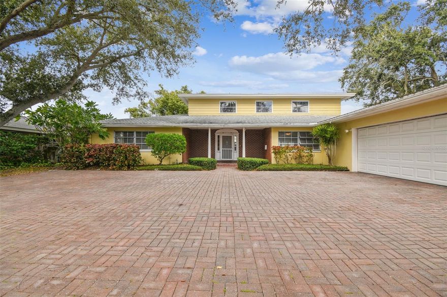 Welcome to your waterfront oasis in the heart of St. Petersburg's prestigious Snell Isle Estates neighborhood! This prime piece of real estate presents a rare opportunity to build your dream home on one of the most desired waterways in St. Petersburg. Along stunning Tampa Bay, this exceptional property offers 145 feet of breathtaking waterfront, creating a serene and private retreat just behind the renowned Vinoy Golf Course. With the lot size 121 feet by 146 feet, you can make your creative vision a reality with this rare buildable lot. As you approach this residence, you are welcomed to the quiet cul-de-sac by the shade of grand oak trees that grace the expansive front yard, creating a sense of tranquility and Southern charm. The classic terrazzo floors inside provide a cool and timeless foundation, leading you through an open floor plan that seamlessly connects the living spaces, making it ideal for family living and entertaining. With four bedrooms, two full baths and one-half bath, this home offers spacious accommodations for a growing family or those who love to host guests. The primary suite, strategically positioned to capture the water views, provides a sanctuary to unwind after a day of fishing, boating and relaxation on spectacular Tampa Bay. Step outside to the generously sized yard that awaits your vision for the ultimate outdoor haven. The property features a private dock, beckoning boat enthusiasts and providing direct access to Smacks Bayou and Tampa Bay. Imagine waking up to the gentle sounds of lapping water and the panoramic views of the tranquil bayou. Whether you envision a modern masterpiece or a timeless traditional residence, the possibilities are endless for this exceptional canvas.  Don't miss your chance to own a slice of waterfront paradise in this highly sought-after location. Minutes from St. Petersburg's exciting downtown areas with its many museums, shops, theatres, hotels, upscale restaurants and Vinoy Country Club. Immerse yourself in the St. Pete lifestyle and make this waterfront gem the foundation for your dreams.