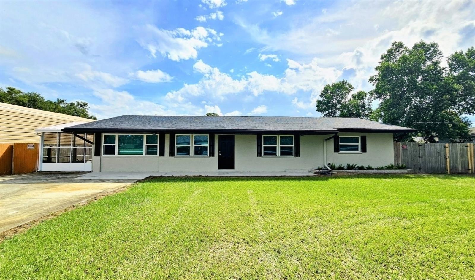 *THIS HOME QUALIFIES FOR A USDA LOAN WITH 100% FINANCING & NO MINIMUM DOWN PAYMENT! PRICED UNDER VALUE & WILL SELL FAST!*
Welcome to the Gem of Ridge Manor! This beautifully updated 4-bedroom, 2-bathroom home located just over the Hernando County line (near Dade City) combines modern upgrades with ideal functionality. With No HOA or CDD and located in Flood Zone "X" (no flood insurance required) this property offers both FREEDOM and AFFORDABILITY!
The moment you step inside you will feel like you're in a new construction home! You'll first notice the OPEN FLOOR PLAN beautiful bright Dining Room Chandelier the perfect room for hosting holidays or dinners. Beyond the Dining Room is the Brand-New Kitchen at the center of the home. A total SHOWTOPPER - complete with Sparkling White Quartz Countertops & Full Quartz Backsplash, New White Cabinets with Brushed Nickel Hardware, Stainless Steel Sink with Industrial Chrome Faucet Sprayer, a huge Breakfast Bar, New Luxury Vinyl Plank Flooring and Stainless-Steel Kitchen Appliances.Â
The entire Interior & Exterior of home was just Re-Painted and BRAND-NEW "Low E" Double Insulated WINDOWS were installed (2025). Other notable upgrades are: New Light Fixtures/Chandeliers/Fans (2025), New Window Blinds (2025) New Security Alarm System on All Doors & Windows (2024), New A/C (2021), New Shingle Roof (2020) & New Tankless Hot Water Heater (2020).
On the left side of the home, off the kitchen, you will find the private master bedroom, ensuite bathroom and walk in closet with laundry area. This room also has its own private door to the newly screened-in covered patio and backyard.Â
All of the other (3) guest bedrooms and (1) full guest bathroom are located on the other side of the home. This split-room layout is most ideal for anyone in the home having their own space! There is also a door in the living room that can be closed to separate guest bedrooms from the living room for added privacy.Â
The guest bathroom is absolutely STUNNING and BRAND NEW: Gray porcelain marble-like tile throughout, sparkling with quartz vanity with white cabinets, New Bathtub/Shower, New Toilet, two Vanity Mirrors and one Full-Length Mirror on the back of the door, Modern Light Fixtures, Hardware and Exhaust Fan.
The Living Room, (which opens to the kitchen) is filled with natural sunlight from the two, Brand New French Doors leading out to the backyard. There is also a storage closet for extra convenience.Â
Enjoy the spacious, fenced backyard - perfect for entertaining, pets, BBQs or quiet evenings under the Florida skies. The backyard has two double gates so you can park an RV, camper, boat, trailer, or ATVs in the backyard! Plenty of room for a shed, a pool, playground, or even a chicken coop!Â
If you love the outdoors, this area checks all the boxes. Just minutes away, you can explore miles of scenic walking & biking trails, the Croom Motorcycle Area, the Withlacoochee River, Silver Lake & plenty of nearby camping spots. Golfers have multiple courses close by, while nature enthusiasts will enjoy the surrounding State Forests, Crystal Clear Springs & quick trips to Florida’s Gulf Coast. Known as the Nature Coast, this location puts you right in the heart of the Sunshine State with convenient access to Tampa, Orlando & Ocala.
This MOVE-IN READY HOME is located near local shopping, dining, things to do, and easy access to I-75. Contact the Listing Agent to see this home today!